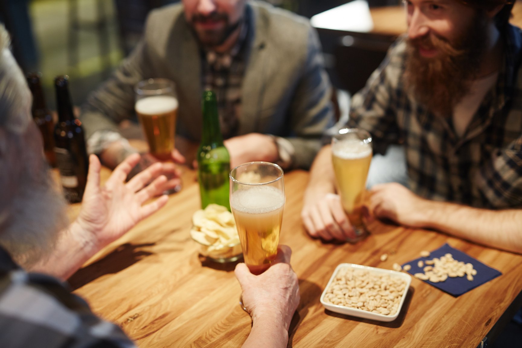 Men Talking at a Bar